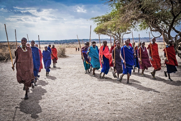 Three Maasai men wearing the distinctive shuka cloth in Kenya